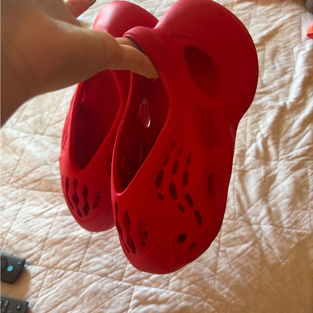 Yeezy Red Slip-On Loafers with Perforated Design